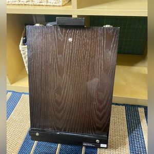 Painting case with easel.